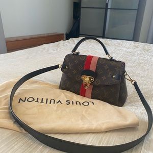 crossbody LV bag.